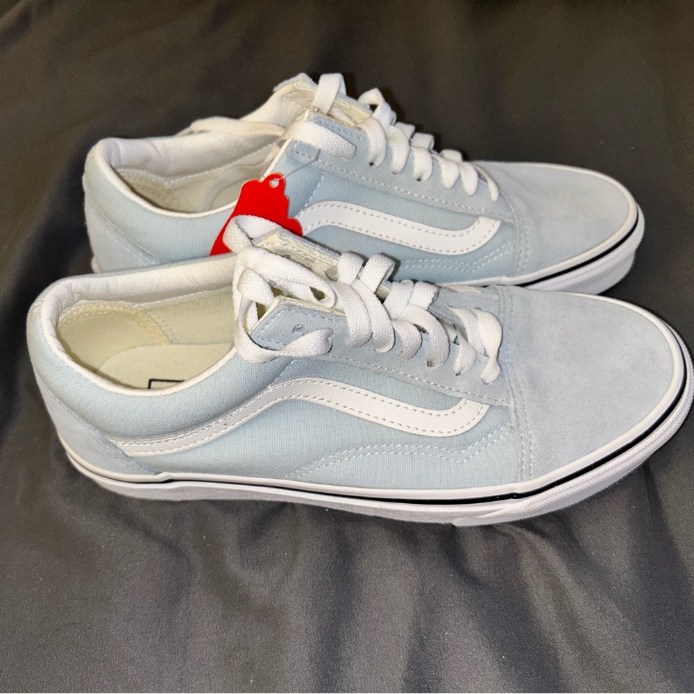 Never worn before Vans, Size 8 in Woman and 6.5 in Men’s, color is light blue